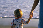 mother and child on beach